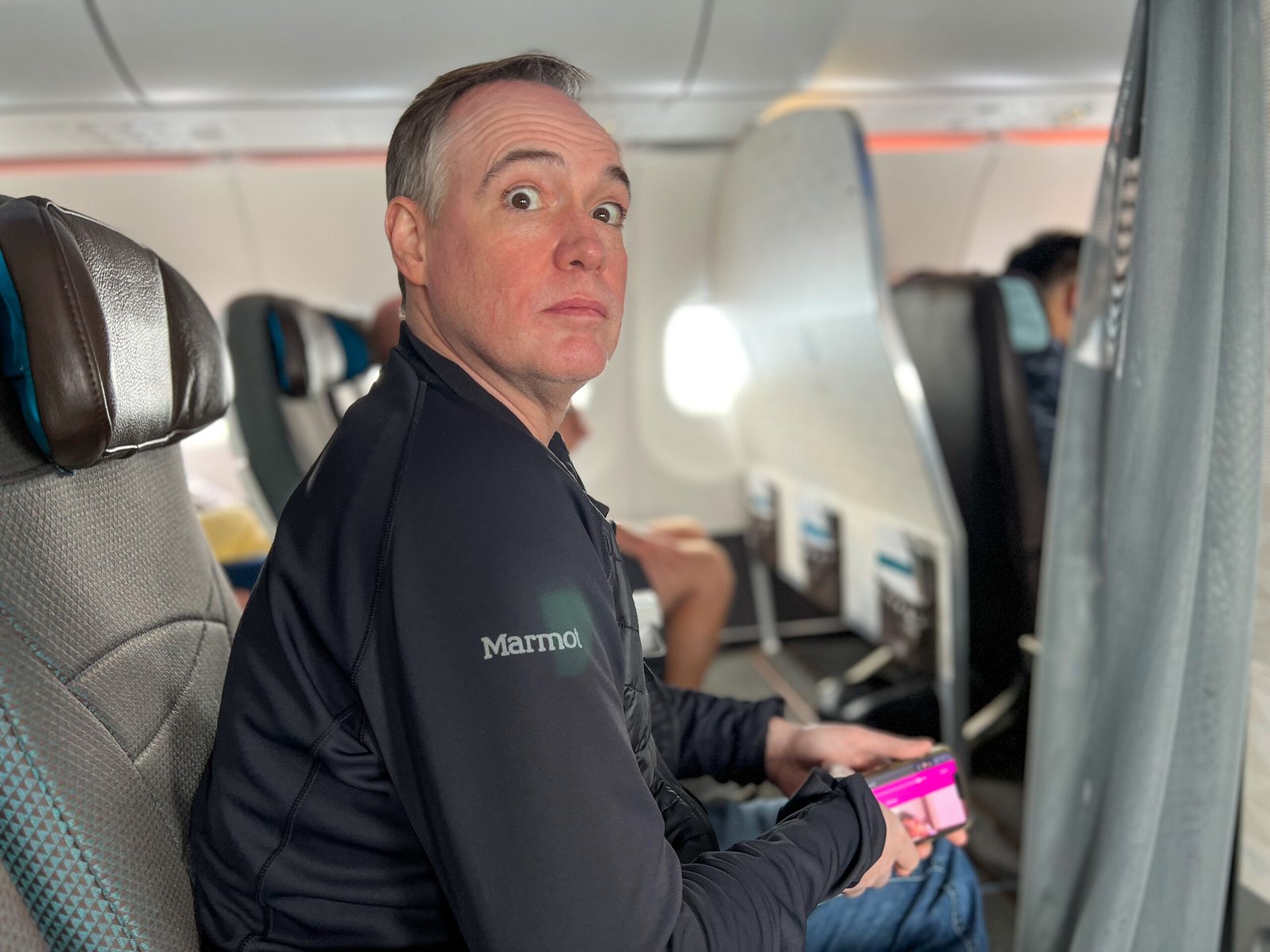 Brian on Plane looking stunned