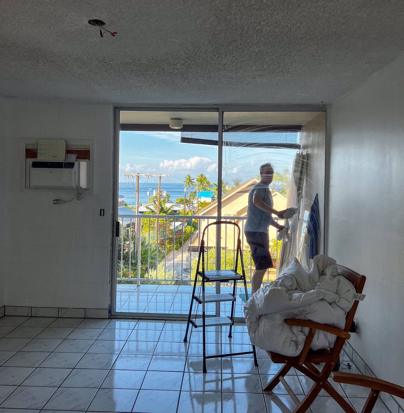 Scrubbing the windows to improve our ocean view
