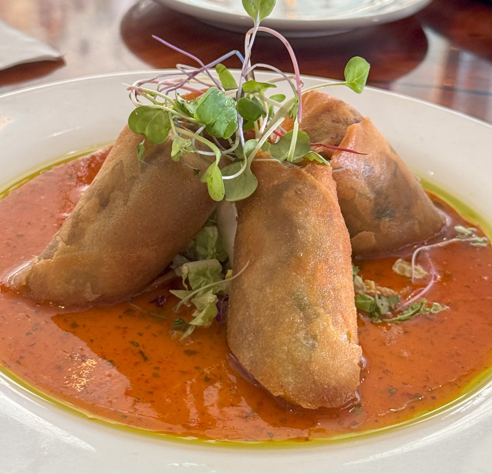Kalua Pork Spring Rolls, served with sweet chili dipping sauce
